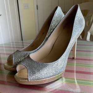 Ivanka Trump silver and gold platform heels